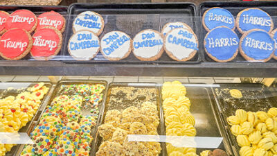  Chocolate chip cookies decorated with the names of presidential candidates Kamala Harris and Donald Trump, as well as Detroit Lions head coach Dan Campbell, are displayed as part of a cookie election at Mannino’s Bakery in Sterling Heights. 