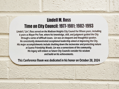  A plaque outside the door to the conference room commemorates the dedication.  