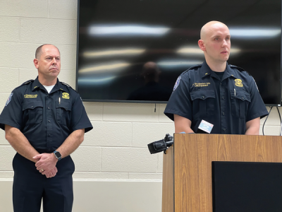  Warren Police Lt. Jonathan Pickett, left, and Lt. John Gajewski, right, are at the press conference about the $60 million lawsuit.  