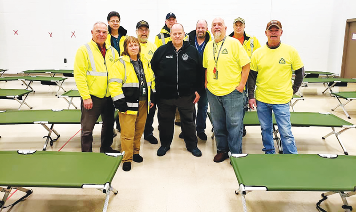  Warren CERT Director Michael Riley, middle in black, and the CERT team at a training session. 