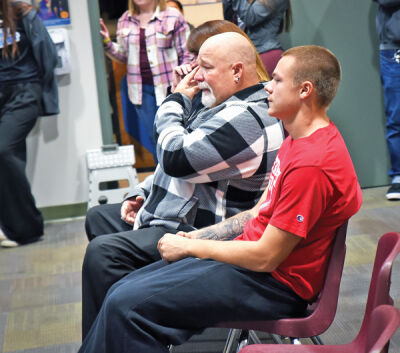  The family of Connor McMahon — mom Kathleen, dad Corey and brother Carter — react to the unveiling of the quote on the wall at the Recreational Authority of Roseville and Eastpointe. “We want to keep Connor’s memory alive,” RARE Director Tony Lipinski said. 