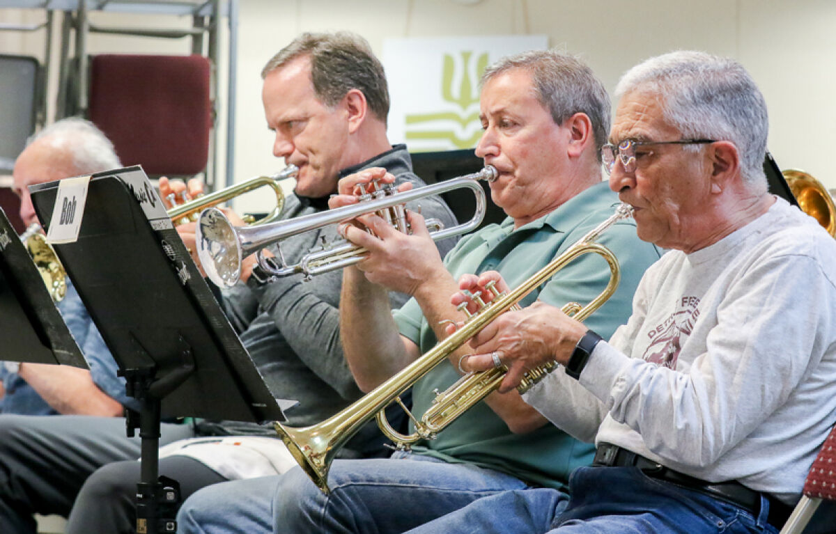  Members of the Heritage Concert Band of Troy rehearse at First Presbyterian Church of Mount Clemens. The band usually rehearses at the Troy Community Center. 