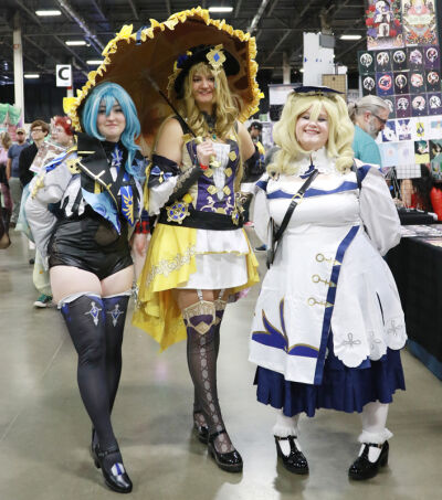  Charlotte Clavet, left, Jayal Roethlisberger and Liz Street, all of Rockwood, cosplay as characters from the video game Genshin Impact. 