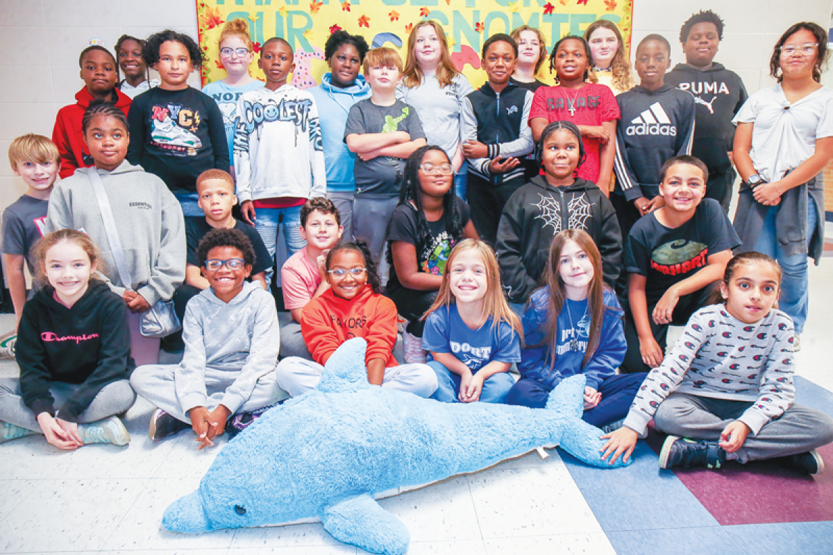  The fifth grade students in Lisa DeFelice’s class at Dort Elementary School in Roseville won Dewey for the week for having the best class attendance the previous week. Every week, the dolphin stuffed animal “swims” to the winning classroom as an incentive for the school’s 6-Cess program. 