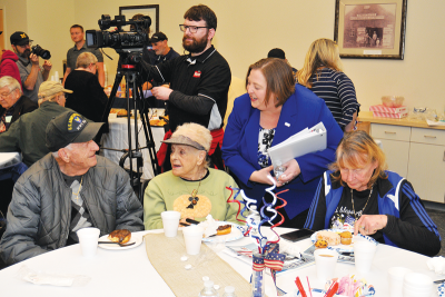  Warren Mayor Lori Stone honors veterans and their families at Warren’s first veterans celebration, “Honoring Heroes with Harmony-Brass and Breakfast.”  