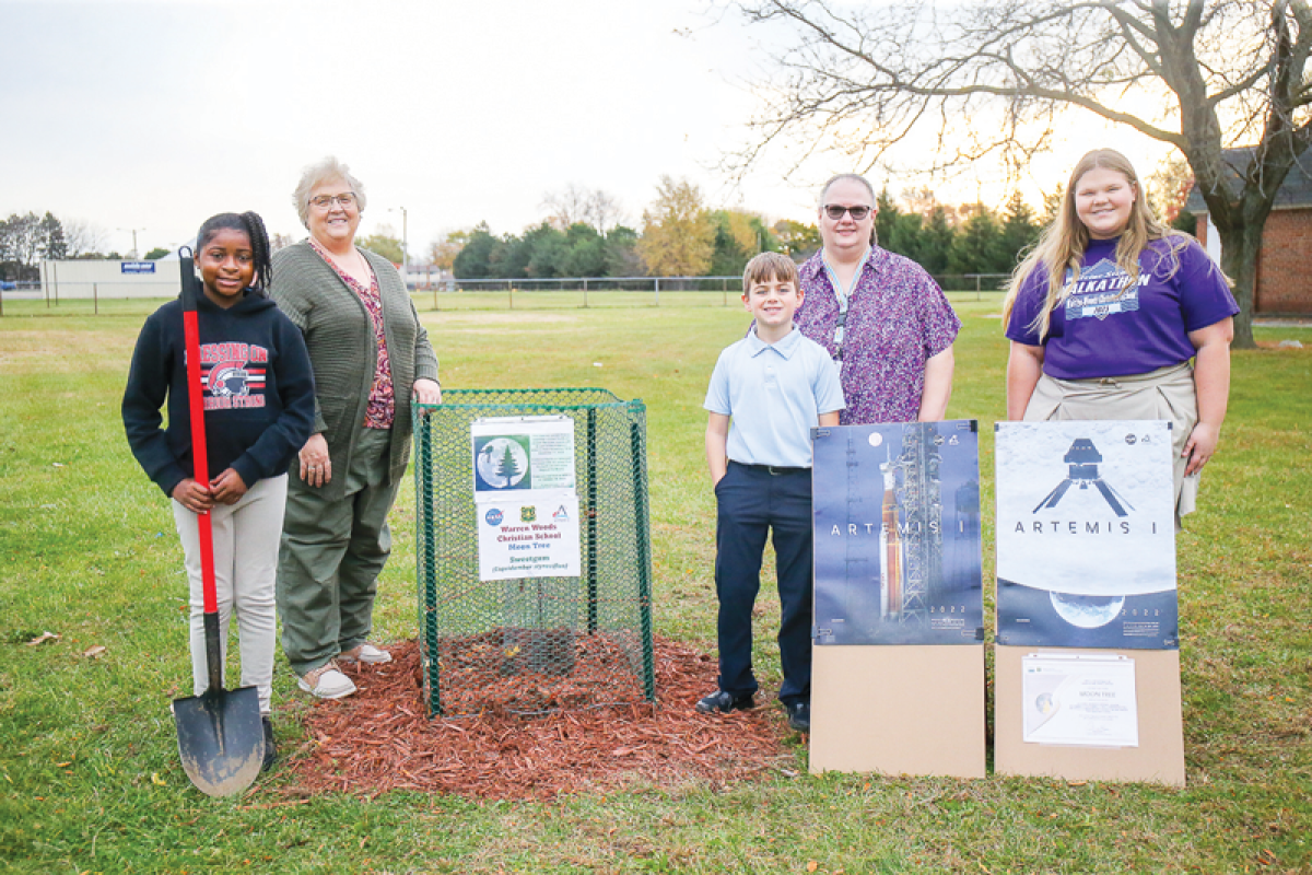  Warren Woods Christian School students received a moon tree seedling from NASA. Pictured left to right are fifth grader Emma Scurlock, School Administrator Beth Denhart, second grader David Verbeke, science teacher Sharon Mullins and eighth grade student Izzy Richards.  