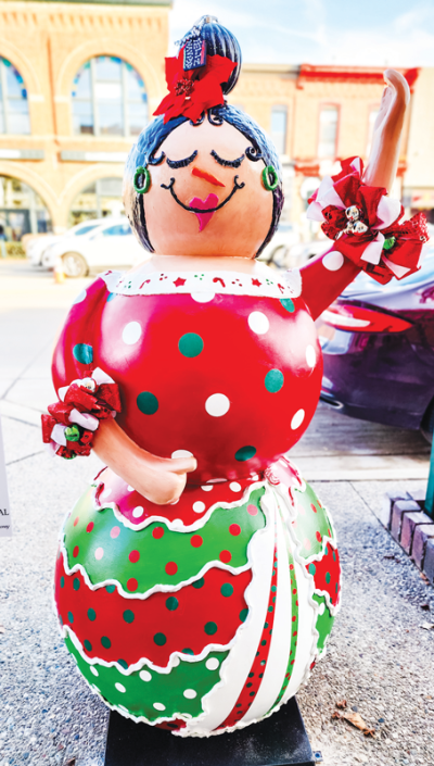   Approximately 12 fiberglass snowmen, like  this one from last year’s event, will be on display along Main Street in downtown Rochester during the Snowman Stroll Dec. 1-31. 