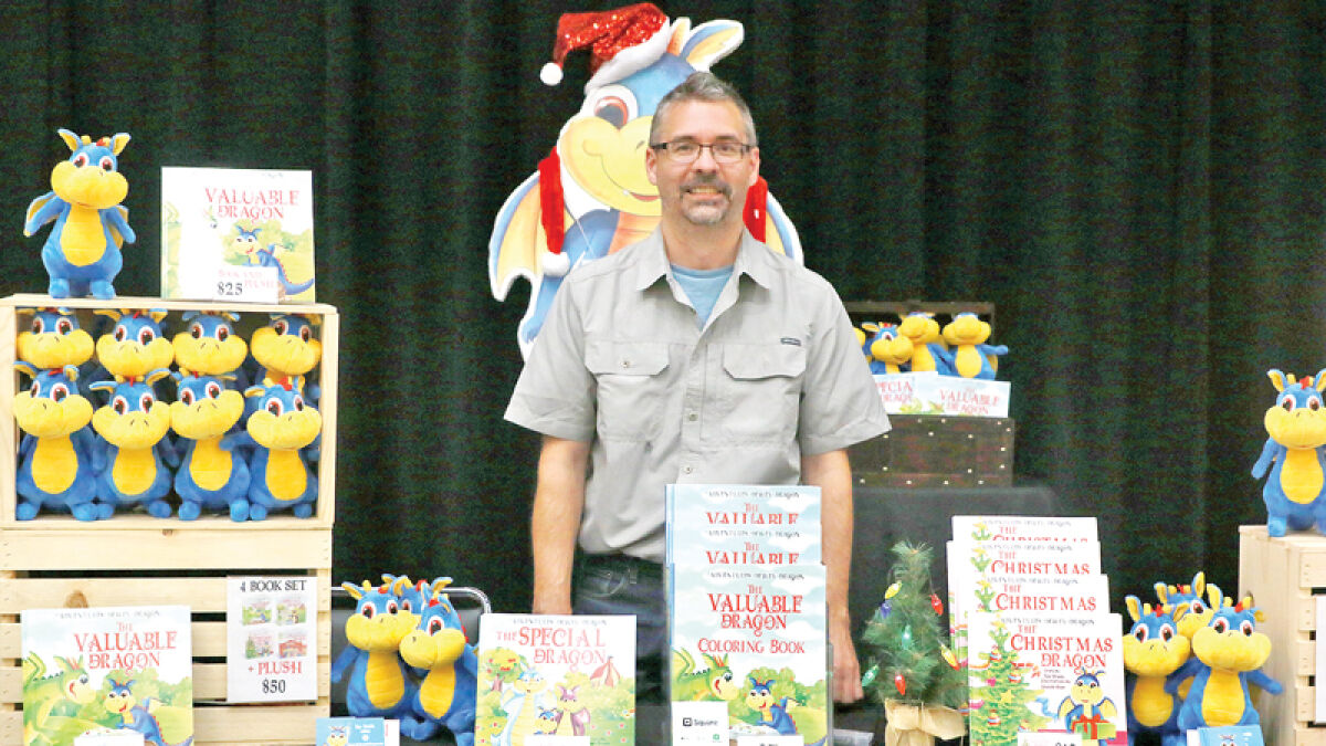  Ron Brooks, author of the “Dewey the Dragon” books, was present during the Local Author Fair at the Troy Community Center. 