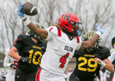  Orchard Lake St Mary’s senior Bryson Williams celebrates a touchdown before he crosses the endzone. 