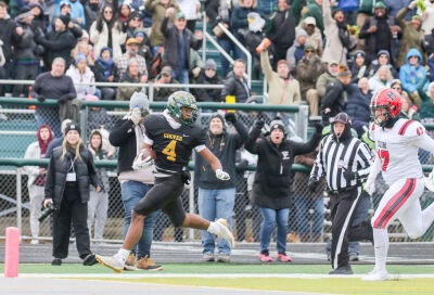  Birmingham Groves senior running back Noah Sanders rushes for a 50-yard touchdown. 