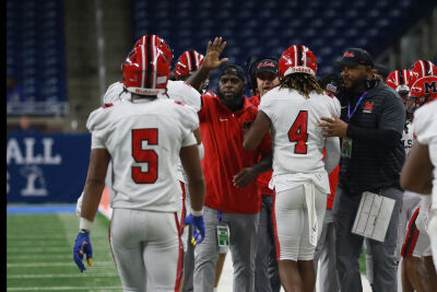  Orchard Lake St Mary's senior running back Darrin Jones Jr. (#5) and senior running back Bryson Williams (#4) walk off the field after a OLSM touchdown. 