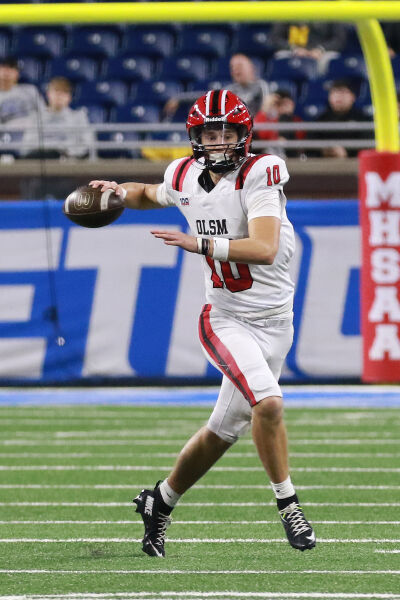  Orchard Lake St Mary's senior quarterback Axel Newell delivers a throw. 