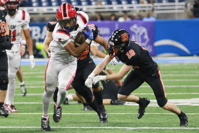  Orchard Lake St Mary's senior running back Darrin Jones Jr. carries the ball during the MHSAA Division 2 state championship game against Byron Center Nov. 29 at Ford Field. 