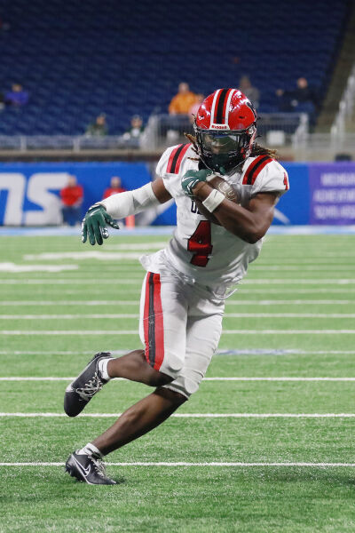  Orchard Lake St Mary's senior running back Bryson Williams carries the ball. 