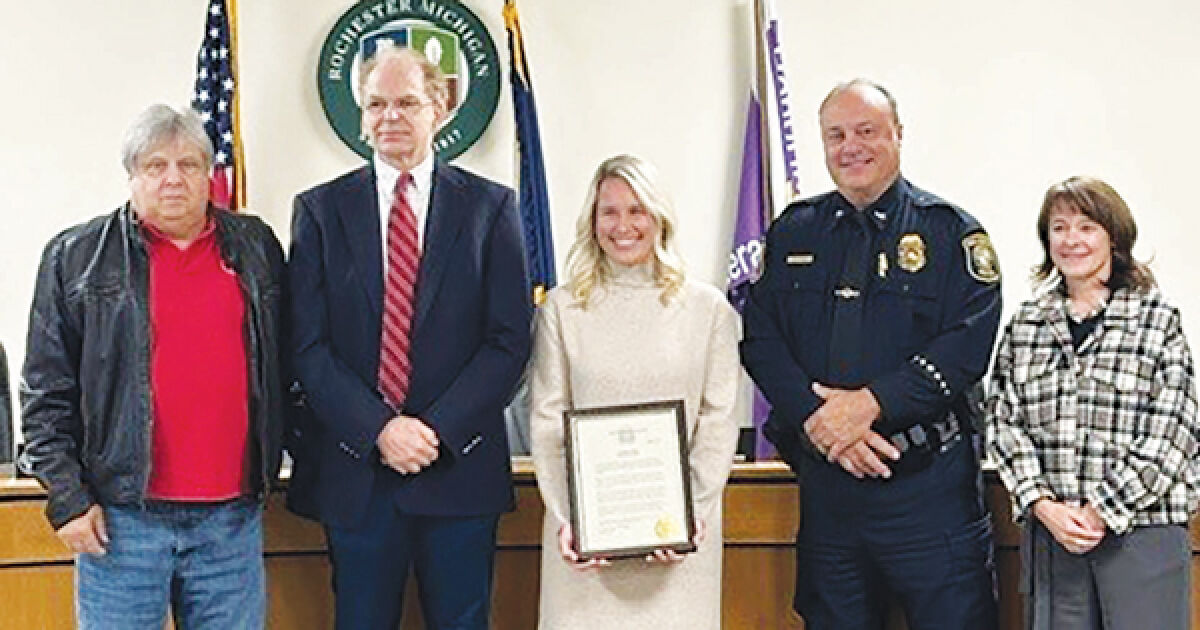  Amanda Drogowski, center, was recognized by Rochester Police Chief George Rouhib during a recent City Council meeting for her help in saving a man’s life. 