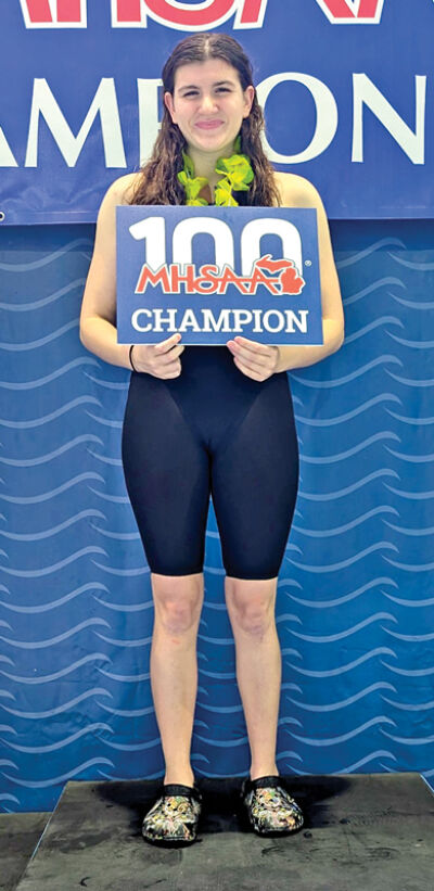  West Bloomfield junior Elizabeth Eichbrecht is all smiles after winning the state championship in the 200 freestyle. 