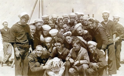  Sailors aboard the USS Oklahoma pose for a group photo.  