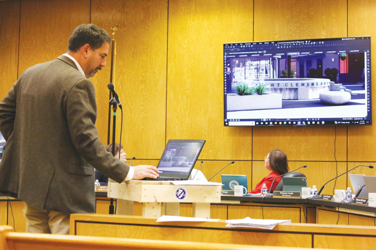  Kyle Seidel, AEW project manager, presents updates to the Downtown Revitalization Project to the Mount Clemens City Commission on Dec. 2.  