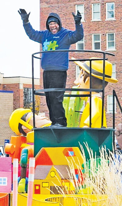  Corewell Health Beaumont Grosse Pointe Hospital security officer Stanley Christmas appears on  Corewell’s float in America’s Thanksgiving Parade in downtown Detroit Nov. 28. 