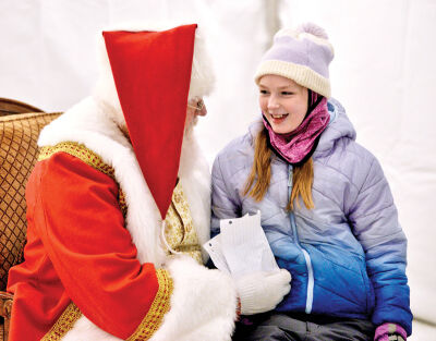  Gianna DiPerna, 9, from Troy, meets Santa. 