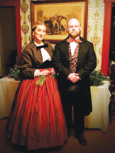  Some of the reenactors who were involved with previous “Victorian Christmas” events dress in costume at Troy Historic Village. 