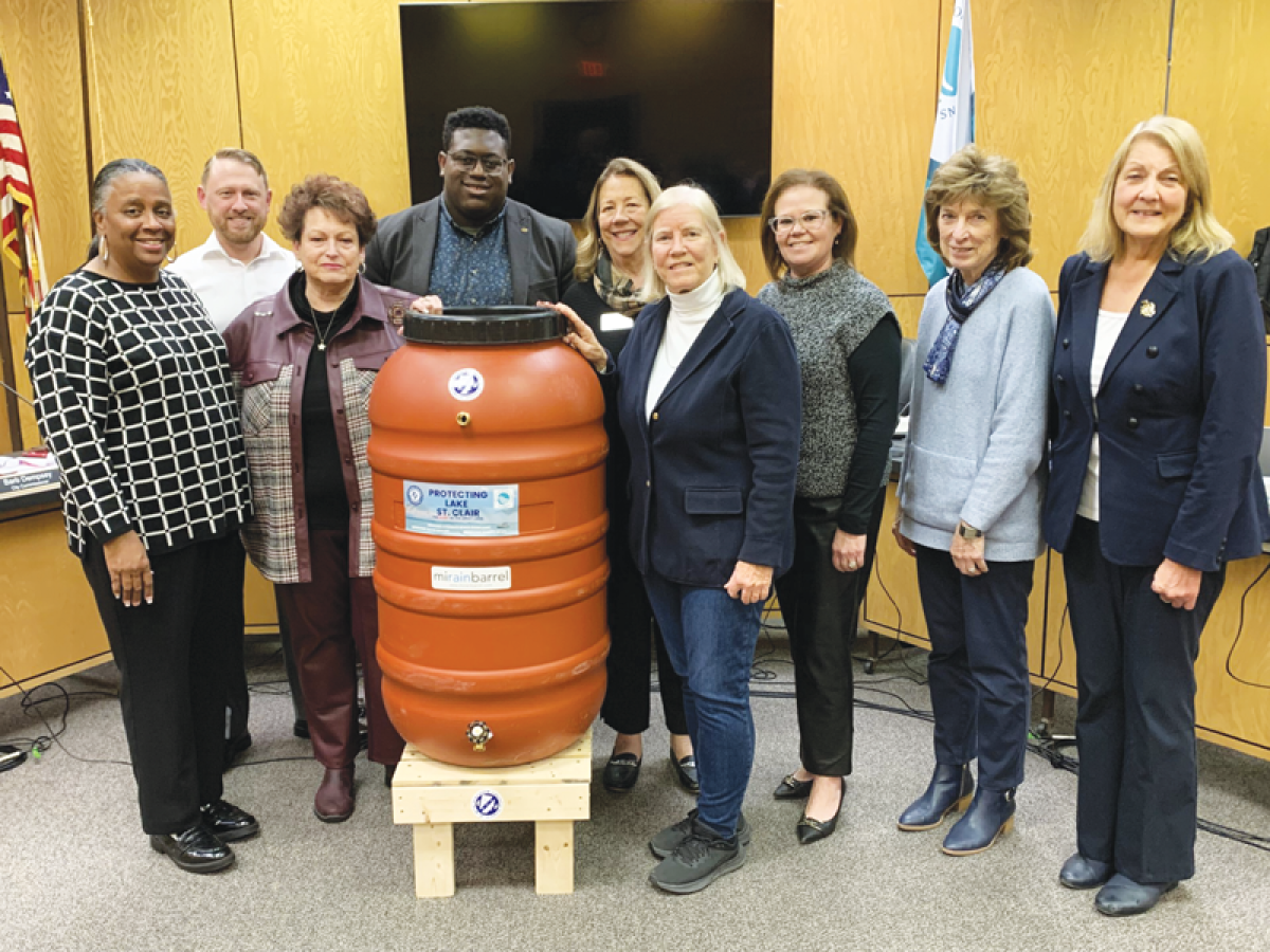  Mount Clemens City Commissioners pose with Macomb County Public Works Commissioner Candice Miller and an assembled rain barrel kit at the City Commission’s Nov. 18 meeting. Mount Clemens is distributing rain barrels free of charge to residents that use combined sewers.  