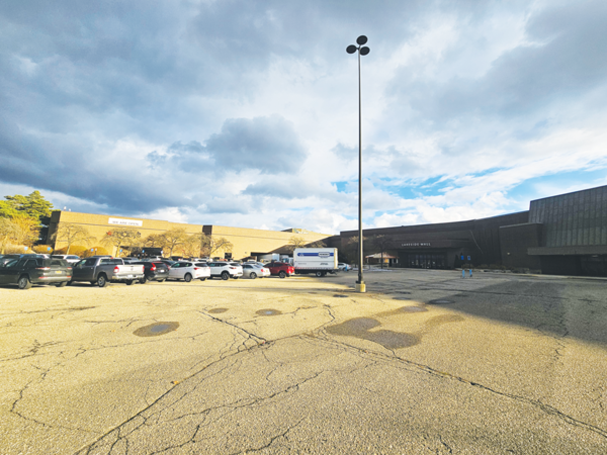  Vehicles are parked in a cluster outside Macy’s in the Lakeside Mall parking lot on Nov. 29, Black Friday. 