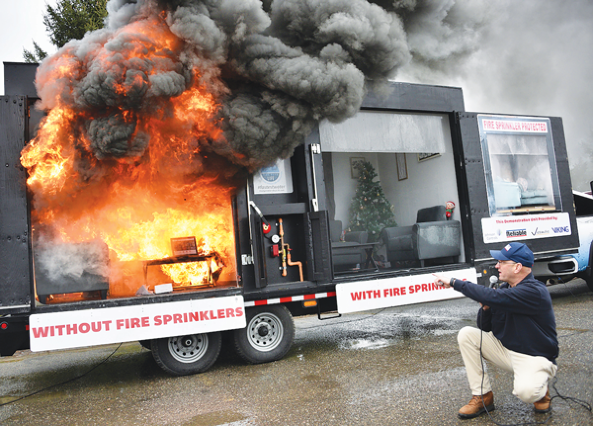  The room without the sprinklers is ablaze and everything is destroyed in a demonstration  presented by Shane Ray, president of the National Fire Sprinkler Association. 