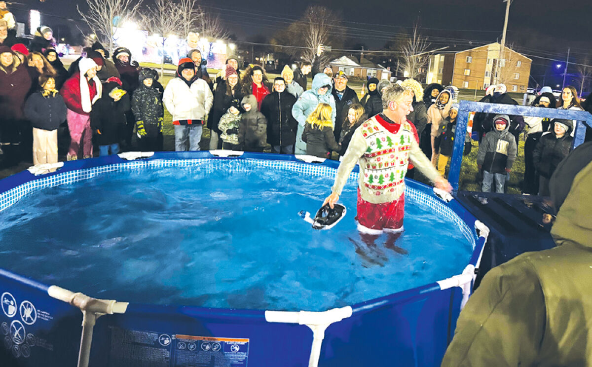  Fraser Mayor Michael Lesich takes part in the city’s second polar plunge Dec. 7 at Steffens Park. 