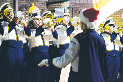  The Fraser High School marching band kicked off the holiday event in front of City Hall. The band played classics and contemporary covers like Metallica’s “Enter Sandman.” 