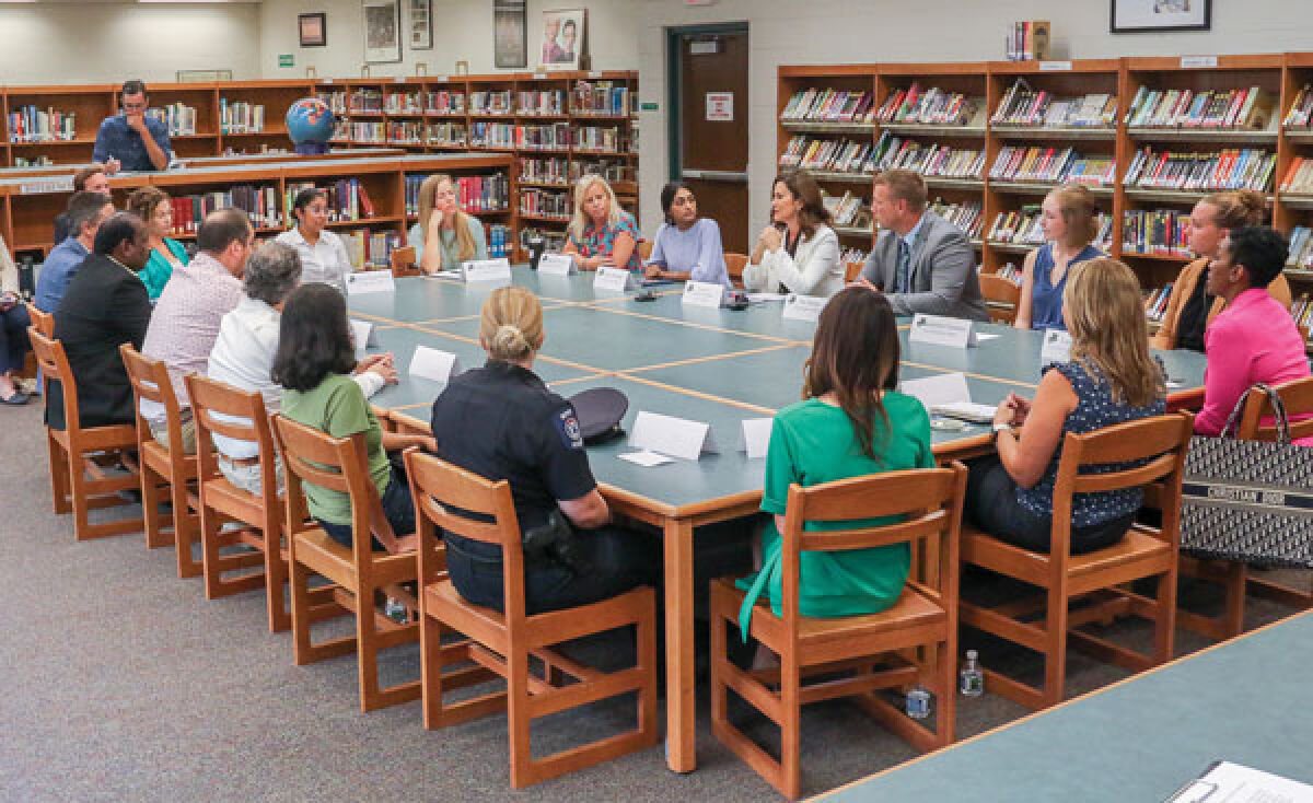  An 18-member panel discusses education during Michigan Gov. Gretchen Whitmer’s visit to Novi High School Aug. 24. 