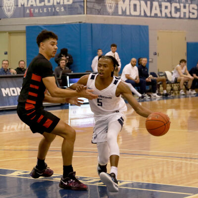  Macomb Community College redshirt sophomore Josh Hines drives during a matchup against Owens Community College Dec. 18 at the Macomb Community College Athletic Center on the South Campus in Warren. 