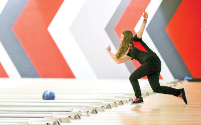  St. Clair Shores Lake Shore senior Avery Koebke bowls during a match against Roseville Dec. 18 at AMF Rose Bowl Lanes. 