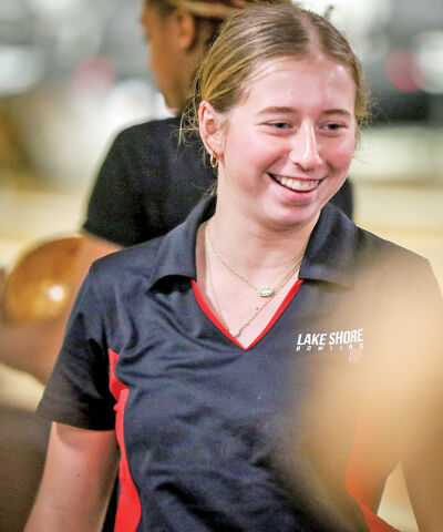  St. Clair Shores Lake Shore sophomore Sara Augustitus is all smiles during a match against Roseville. 