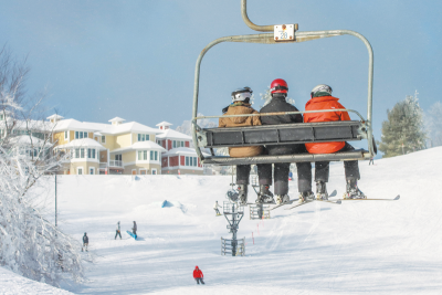  Skiers enjoy the ride over the slopes at Crystal Mountain. 