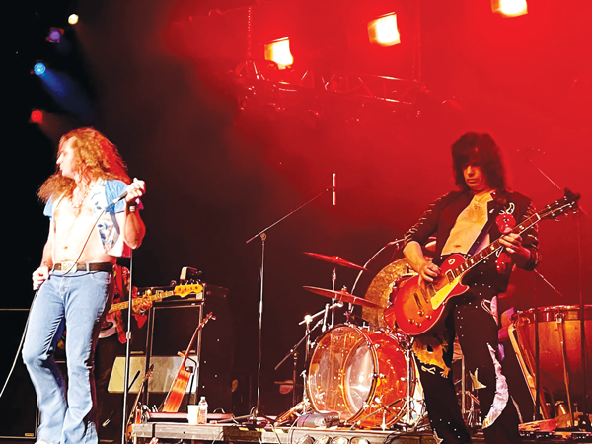  The Led Zeppelin tribute band No Quarter, featuring August Young as singer Robert Plant, left, and Bryan Christiansen as Jimmy Page on guitar will play at the Andiamo Celebrity Showroom on Jan. 25.  