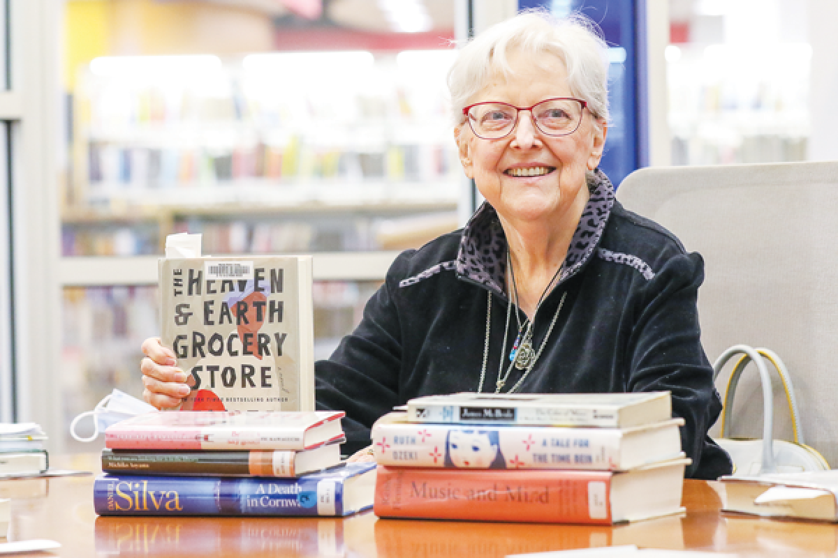  Chris Burk continues to facilitate the Warren Reading Group after 20 years. “Reading and books are my passion. It’s dharma,” she said.  