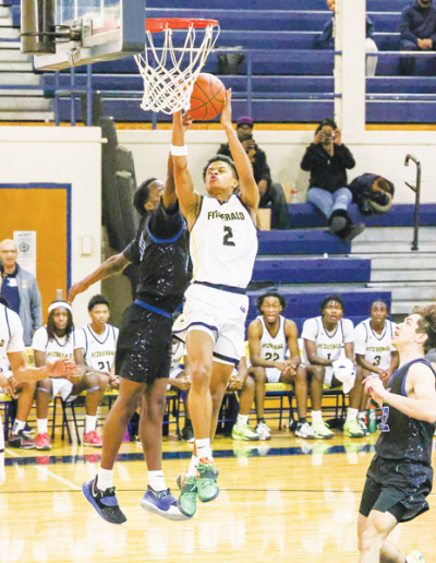  Warren Fitzgerald senior Lydell Sewell goes for a layup against Utica Eisenhower Jan. 15 at Fitzgerald High School. 