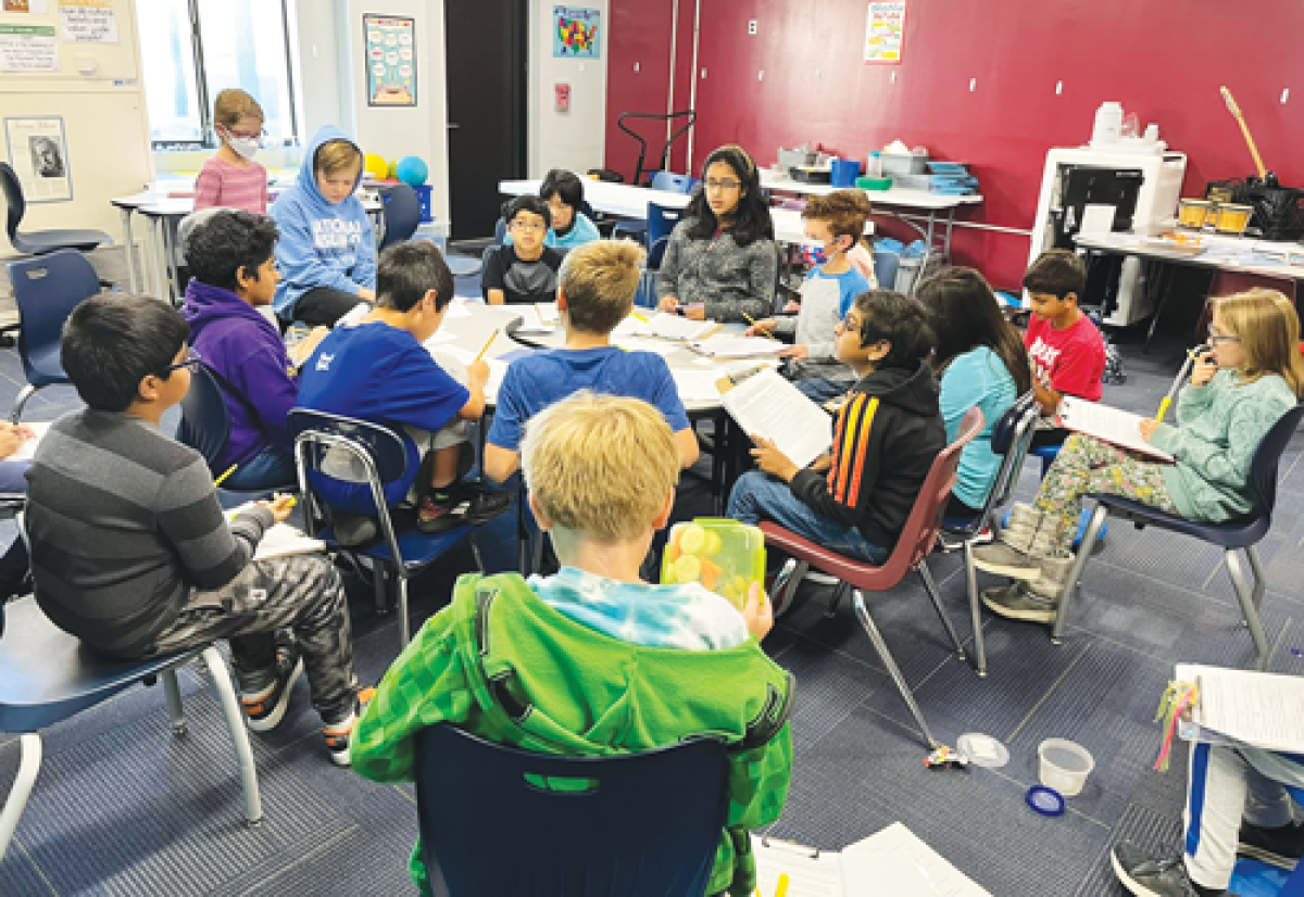  Students at Avondale GATE Magnet School collaborate during class. 