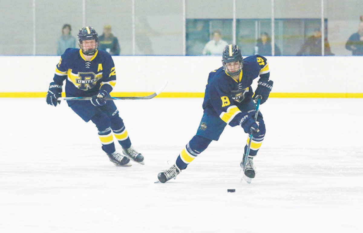  Rochester United sophomore Anthony Belloli looks for an open teammate. 