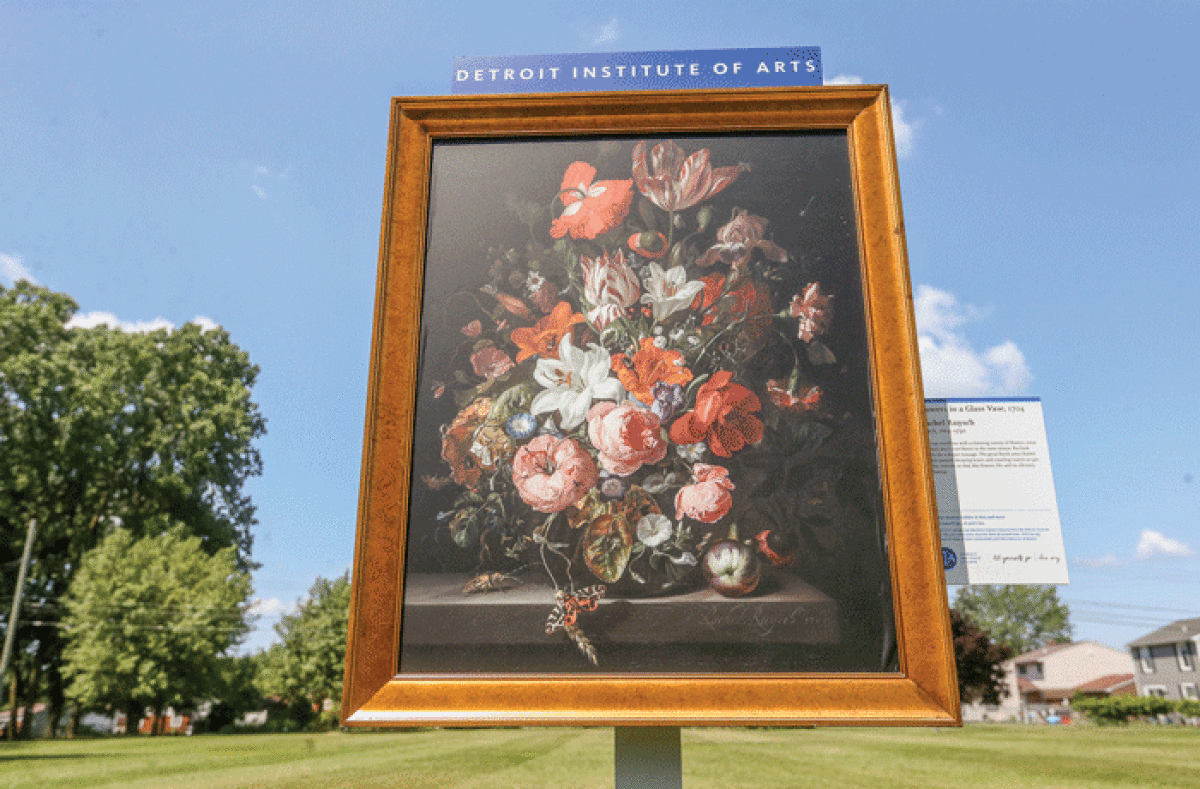  A framed reproduction of “Flowers in a Glass Vase,” by Rachel Ruysch, was installed at the Red Oaks Nature Center, one of two pieces from the collection of the Detroit Institute of Arts as part of its Inside|Out program. 