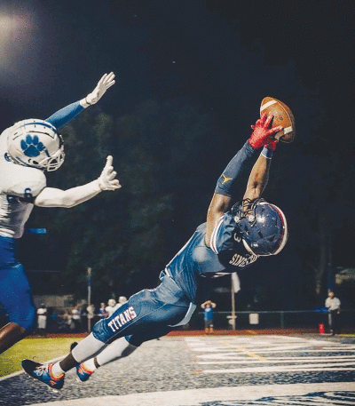  Senior wide receiver Keion Singletary makes a full-extension grab from freshman quarterback Andrew Knight’s pass in overtime to give Stevenson the 26-20 victory over Lakeview Sept. 1.  