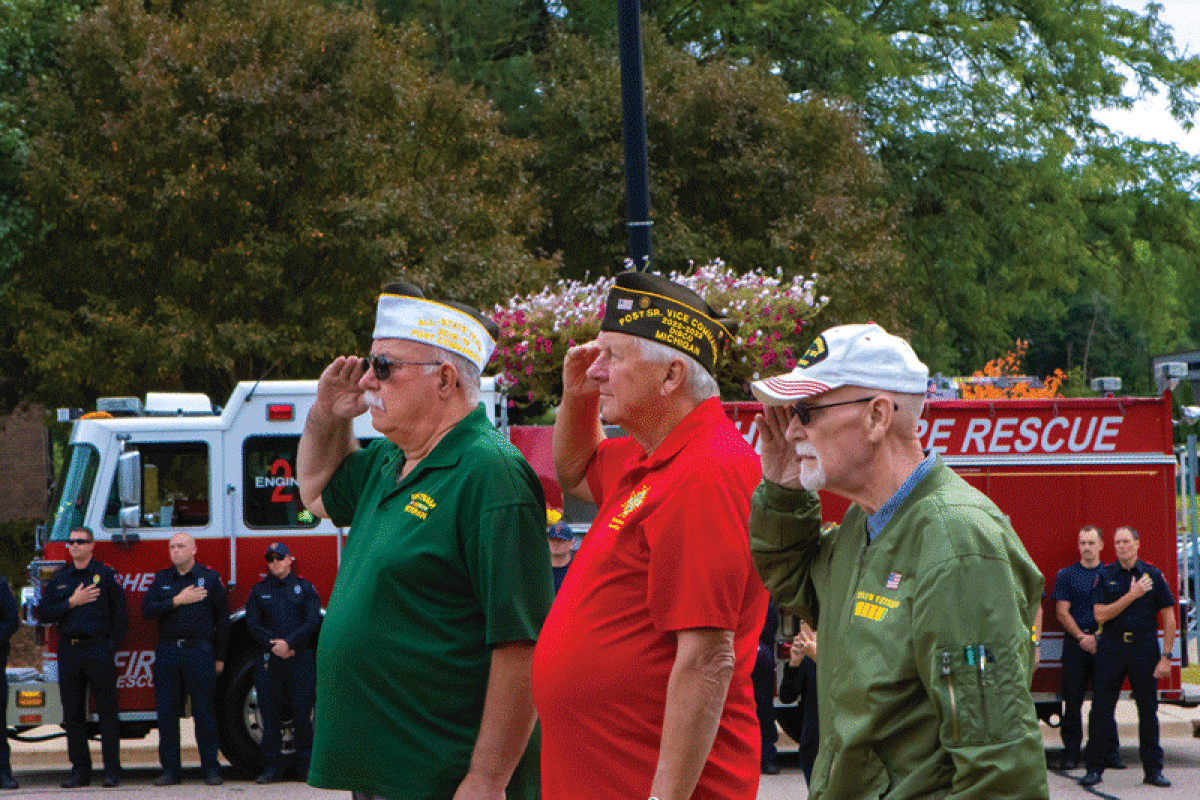  Veterans salute during the Shelby Township Patriot Day ceremony Sept. 12 at the township’s veterans memorial. 