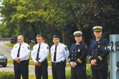  Shelby Township police and fire personnel attend the ceremony, which honored first responders. 